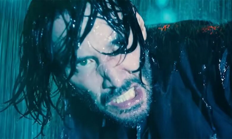 Keanu Reeves angry while fighting in water in John Wick Chapter 4