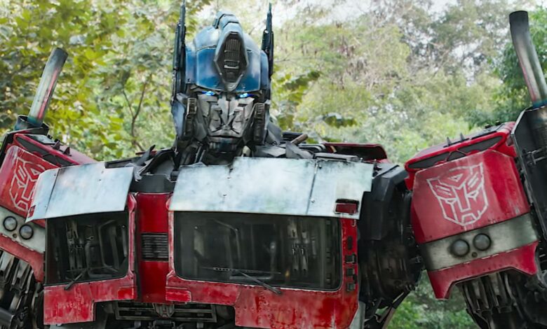 Optimus Prime standing imposingly in Transformers Rise of the Beasts