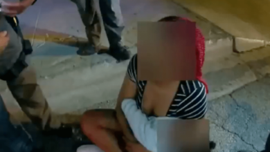 Revelan video de alguacil golpeando a mujer que sostenía un bebé