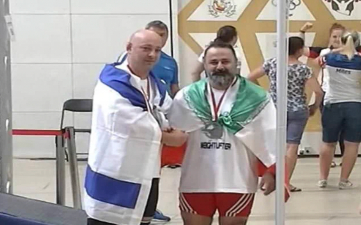 Suspenden de por vida a pesista iraní por estrechar la mano a rival israelita | Tuit