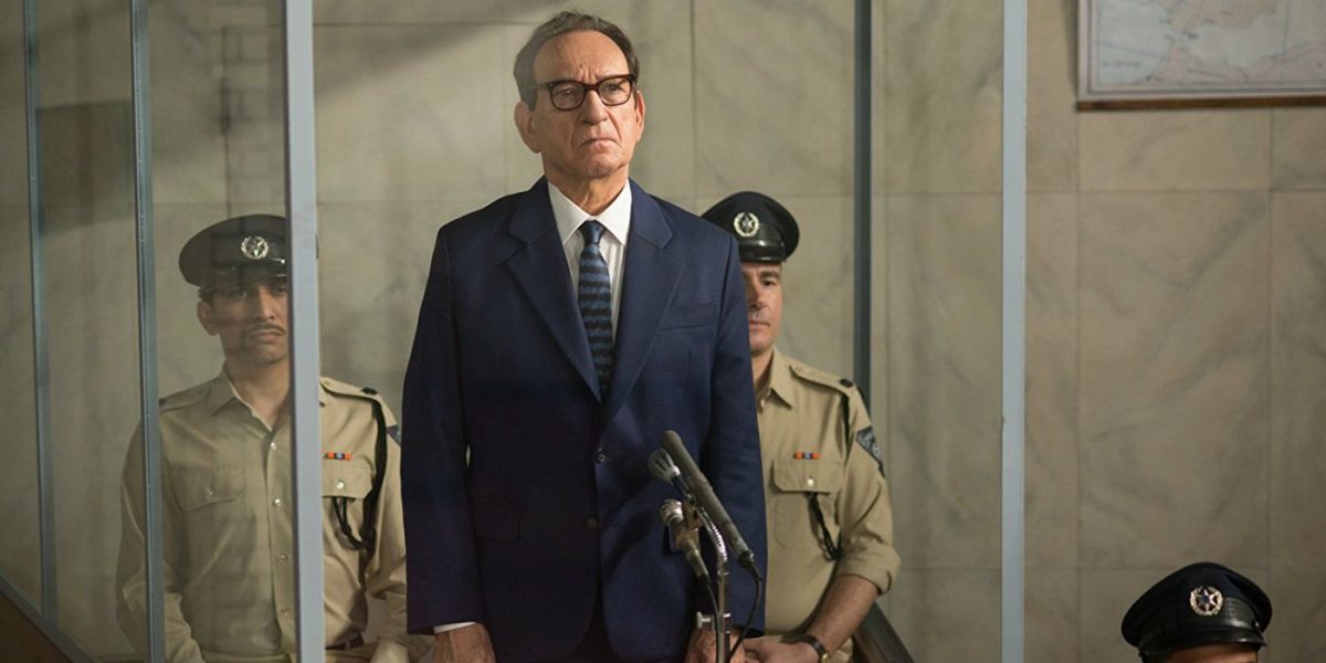 Ben Kingsley standing in a still from Operation Finale