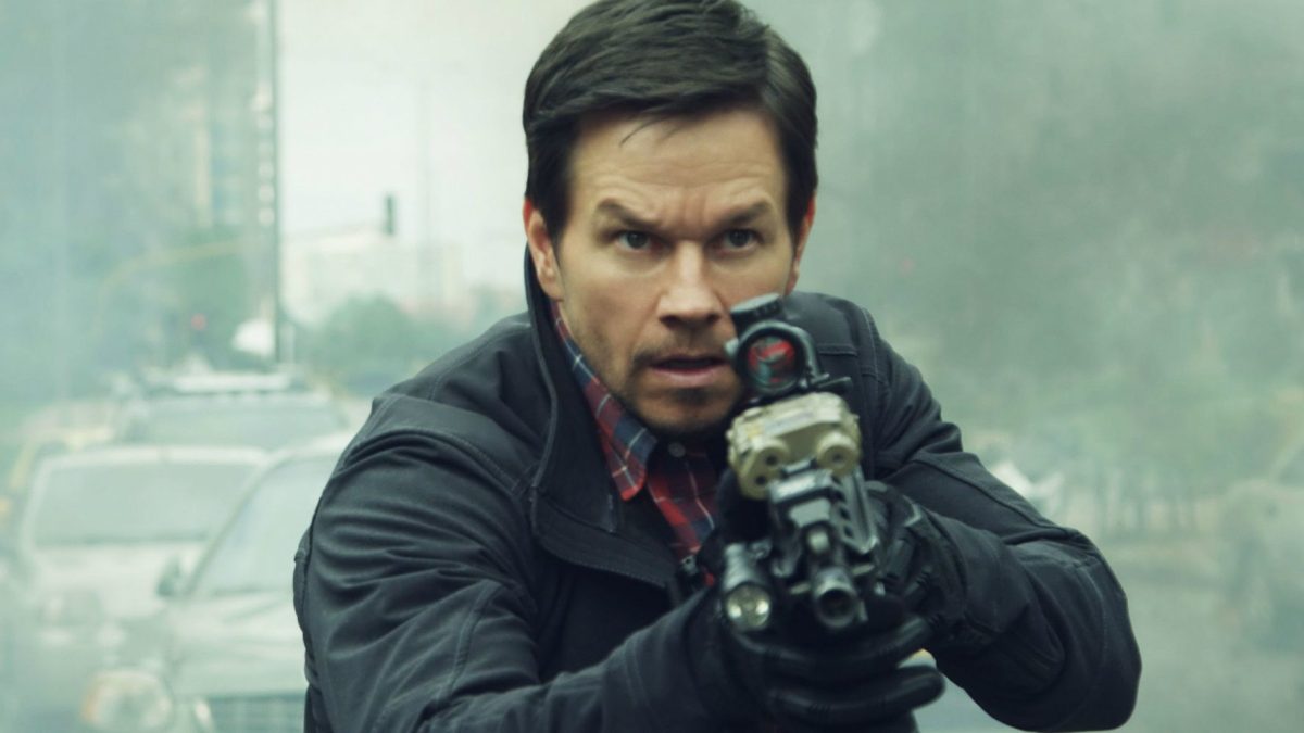 Mark Wahlberg with a gun in Mile 22.