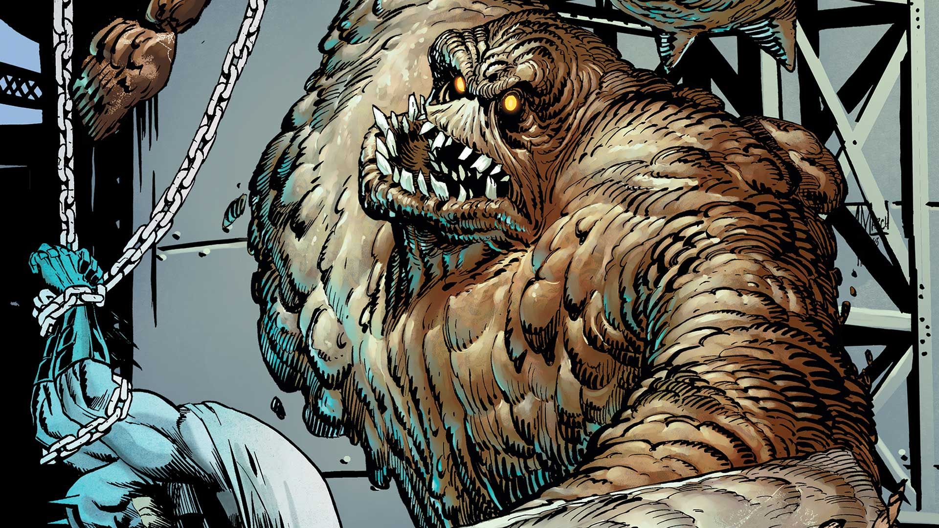 Clayface intenta aplastar a un Batman capturado