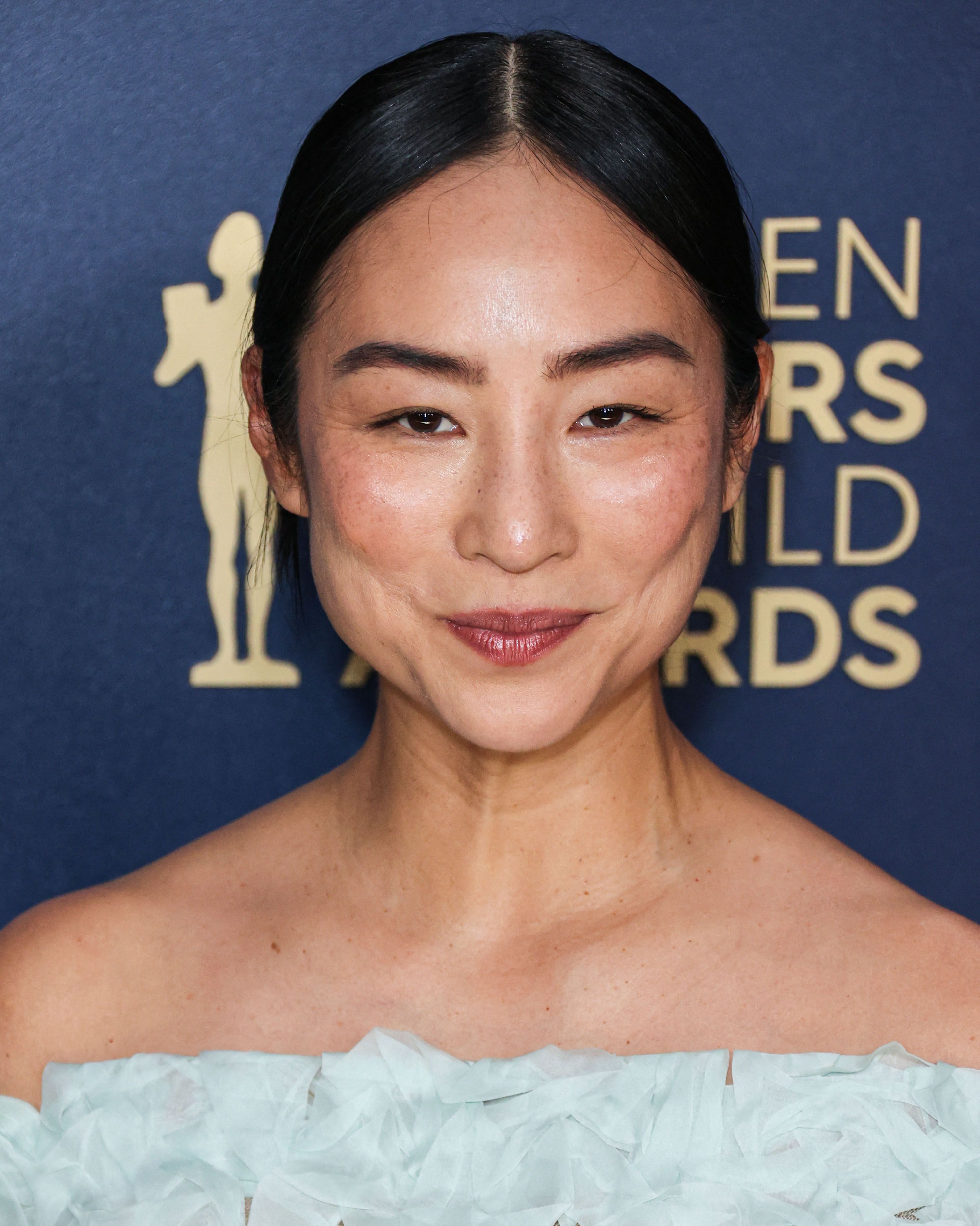 Tiro en la cabeza de Greta Lee