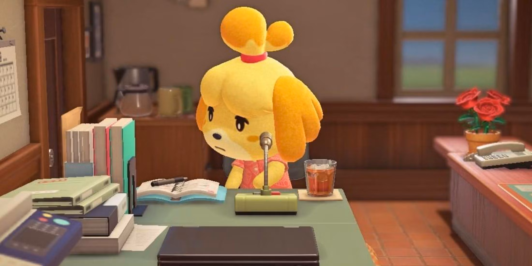 Isabelle parece decepcionada en su escritorio en Animal Crossing New Horizons