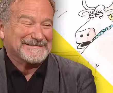 Robin Williams se ríe del cómic del otro lado con una vaca