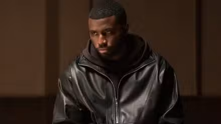 Némesis, Y'Lan Noel como Coltrane Wilder