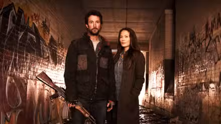 Noah Wyle y Tom y Moon Bloodgood y Anne Glass
