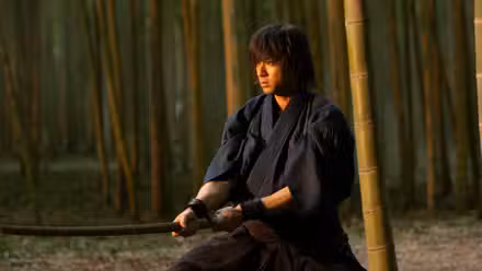 Toshizo sosteniendo un boken en Canción del Samurai