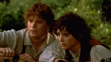 Elijah Wood como Frodo Baggins Sean Astin como Samwise Gamgee en El Señor de los Anillos