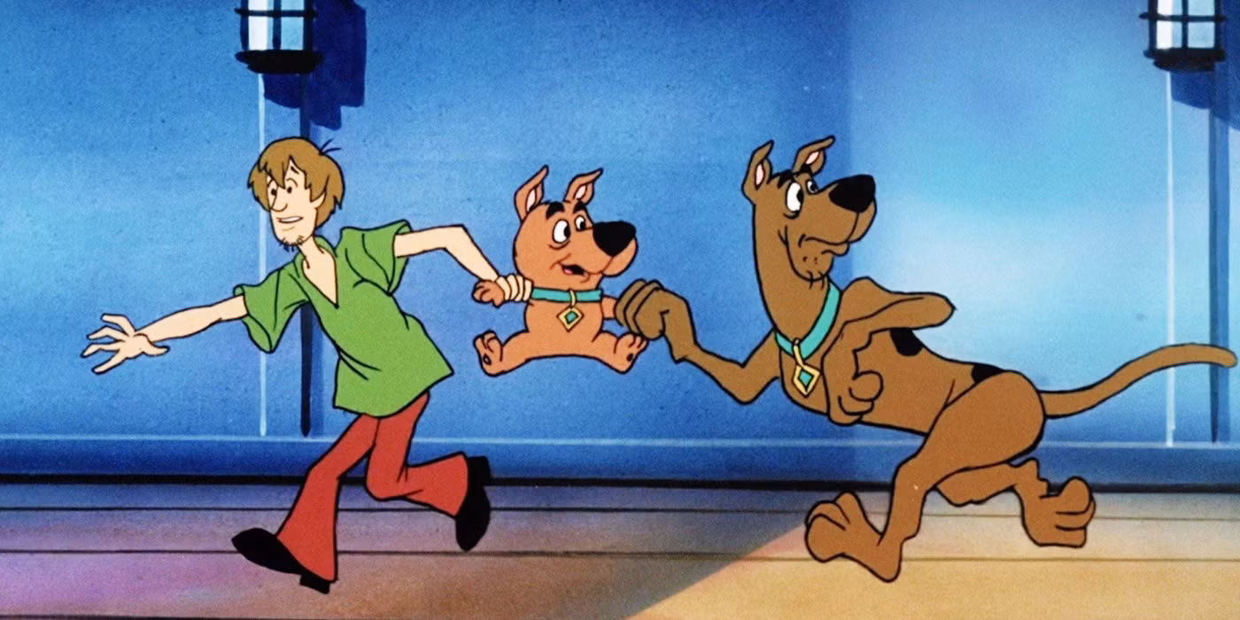 Shaggy y Scooby-Doo cargando a Scrappy-Doo