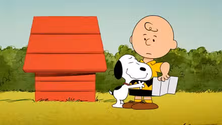 Peanuts con Snoopy abrazando a un confundido Charlie Brown