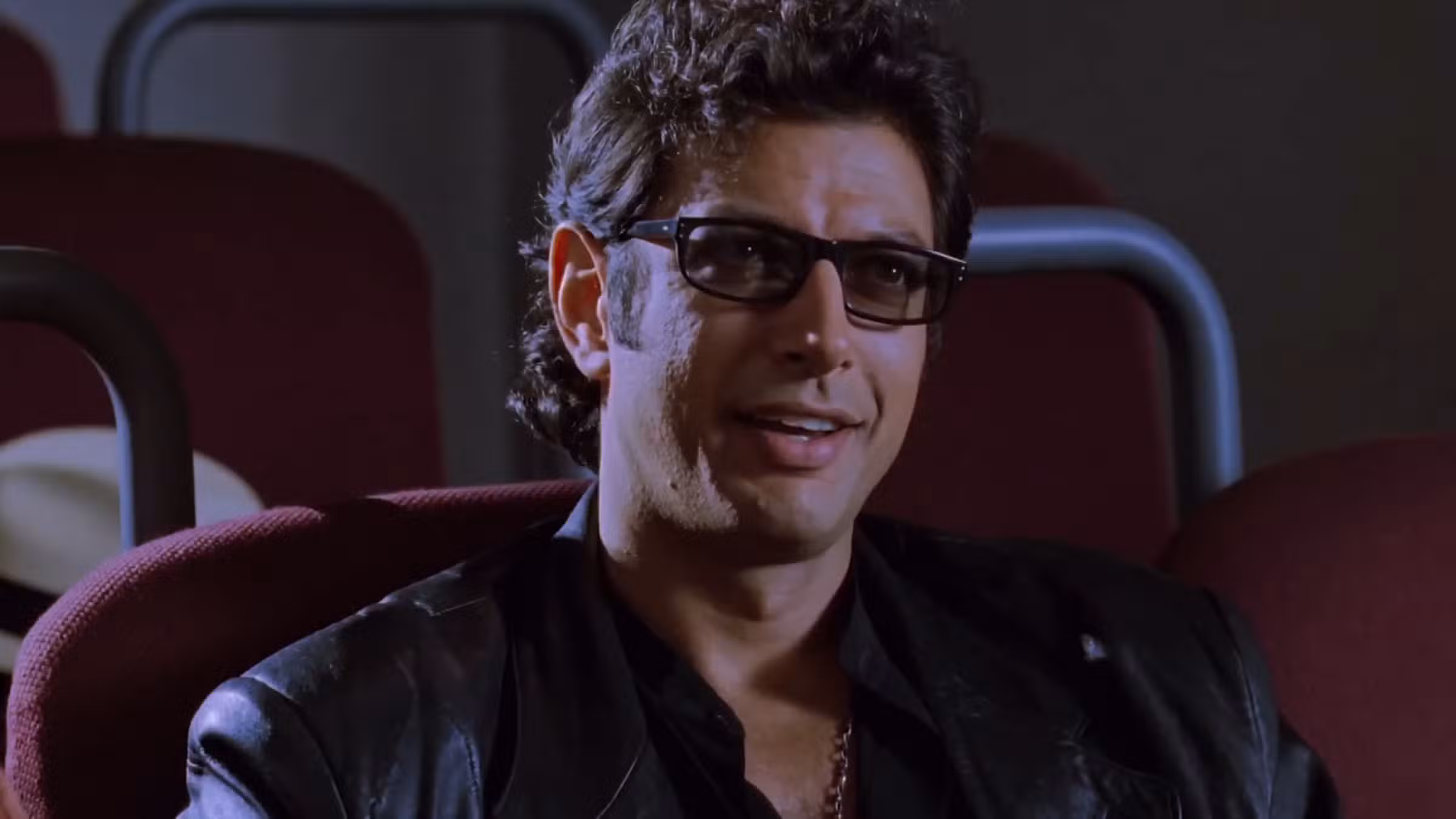 Jeff Goldblum como Ian Malcolm viendo Mr DNA en Jurassic Park